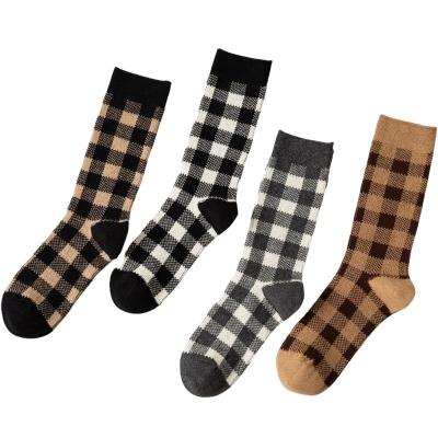 China Sporty Knitting Cotton Sports Lattice Socks Black And White Women for sale