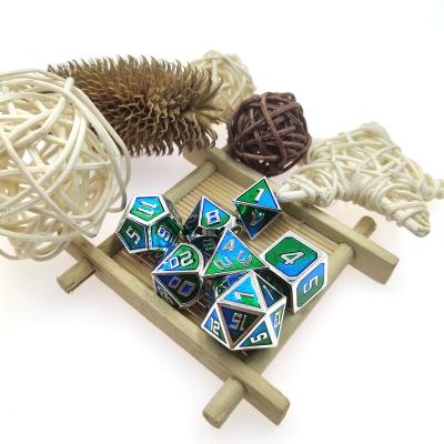 China wholesale fashionable luminous silver light blue green dnd metal dice entertainment game bulk dice for sale