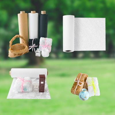 China Biodegradable No Pollution No Wrapping Cushion Fill Roll Honeycomb Kraft Paper Cut Eco-friendly Protective Wrap for sale