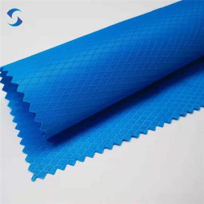 China 300D Ripstop FDY Diamond Waterproof Oxford Fabrics PU600 Polyester Oxford Fabrics for sale