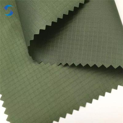 China Waterproof PU Coating 190T Taffeta Ripstop 0.4 Grid Lining Fabric Polyester Taffeta Fabric for sale