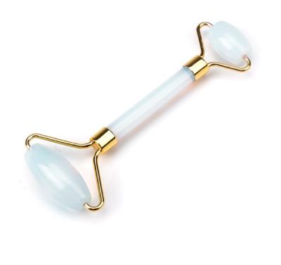 China Face Lift 100% Natural Unwelded Frame Jade Stamping Facial Roller With Gold Sliver Metal Handle for sale