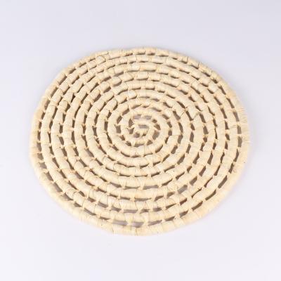 China Viable Natural Rattan Mat Braided Round Woven Straw Place Mats For Dining Table for sale