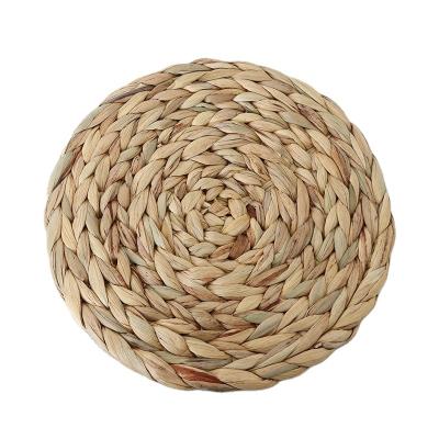 China Handwoven Weave Water Hyacinth Area Rug Sustainable Grass Round Color Natural Place Mat for sale