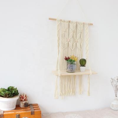 China Minimalist Amazon Hand & Woven Floating Macrame Wall Hanging Shelf for Living Room Decorations Wall Hanging Decor for sale