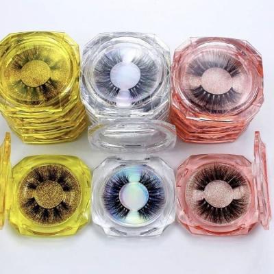 China Fashion New Design 25mm Wholesale False Criss-Cross Custom Mink Eyelashes For England With Packaging for sale