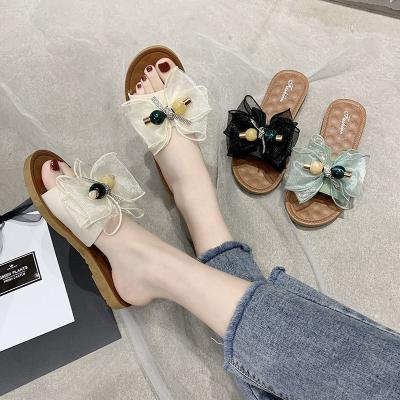 China FashioninsWind Lightweight Slippers Women's Summer Wear Cool One-Term Sandals Internet Celebrity All-match Bow Soft Bottom Slippers for sale