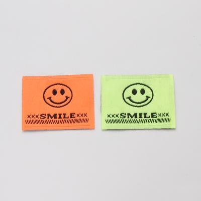 China Other Brand Eco - Friendly Logo Clothing Care Cotton Label Smile Face Garment Cotton Labels for sale