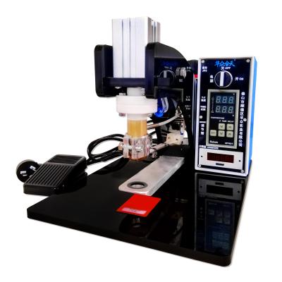 China Various types of high quality Semi-automatic plastic bag degassing valve installed machine for coffee bags coffee bag pressing valve machine for sale