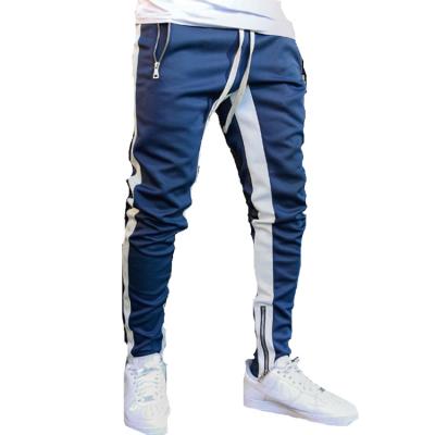 China Men Streetwear Breathable Super Hot Sport Tracksuit Zipper Pockets Bandage Lace Up String Pants for sale