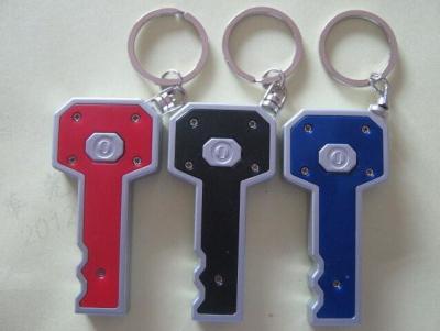 China Custom Plastic Key Shape Led Flashlight Keychain / Led Torch Keychain 8*3.5CM For School Students Gift for sale