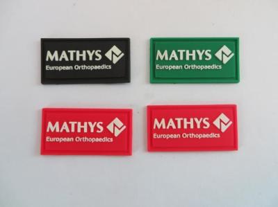 China Cool Black Green Red 3d Embossed Logo PVC Patches For Clothing Garment , For MATHYS European Orthopaedics for sale