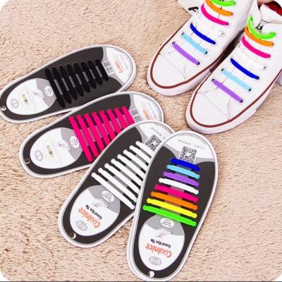 China Niza mujeres unisex frescas del hombre ningún cordón de goma de la zapatilla de deporte del cordón del silicón del lazo, diseño 8+8 con 12 colores, para el regalo del deporte en venta