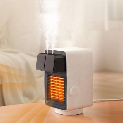 China Cheap Household Factory Fan Heater Air Humidifier PTC Portable Warm Ceramic Heater Led Light Desk Fan Heater For Office for sale