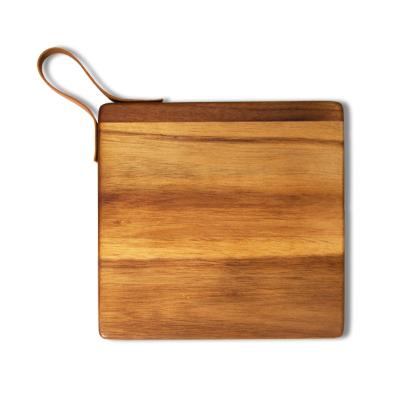 China Sustainable Natural Acacia Wood Square Cutting Board Hanging Function With Hide Rope Handle Kitchen Panel for sale