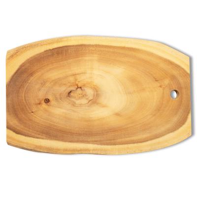 China Texture Viable Natural Acacia Wood Chopper With Wooden Edge Tray Complete Tree Rings With Natural Hole Cut for sale