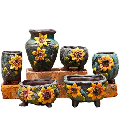 China Modern Ceramic Flower Pot Sunflower Garden Succulent Pots With Legs Plants Garden Porcelain Hand Painted Planter for sale