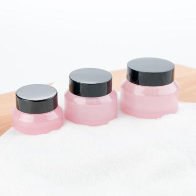 China Recyclable Face Eye Glass Bottles And Jars Bottle Cosmetics Pink Shoulder Cream Box for sale