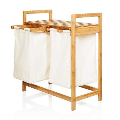 China Artisan Bamboo Double Laundry Hamper Two-Piece Laundry Basket with Shelf for sale