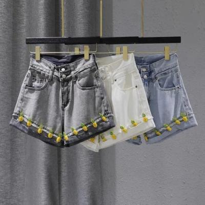 China Summer Hot Women's Anti-wrinkle style sexy button denim shorts ripped jeans jeans short pants for women for sale