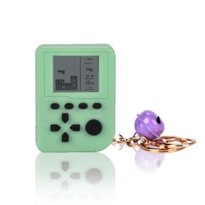 China Plastic Makers Head Mini Game Console Pocket Toys Tetris Loop Game Box Small Game Boy Gifts for sale