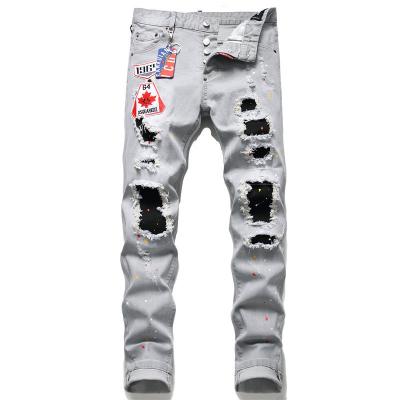 China QUICK DRY Broken Brutal Handsome Paint Hole Maple Leaf Maple Leaf Throw Jeans Beggar for sale