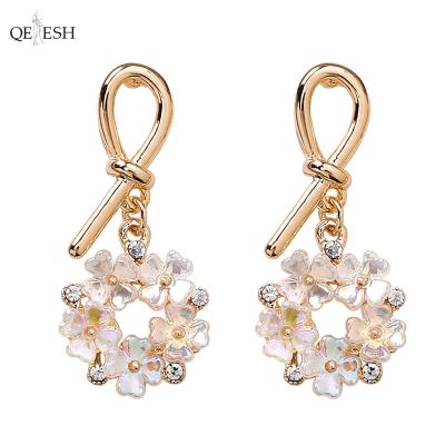 China Viable Qetesh Tied Literary Stud Diamond Hoop Earrings For Girls Golden Shell Flower Earrings Short Geometric Retro for sale