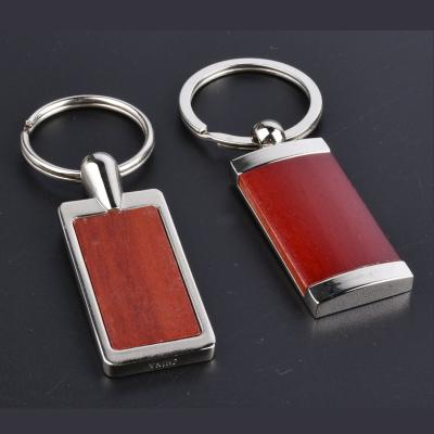 China Factory Supply Chinese Wood Frame Metal Keychain Beech Puzzle Piece Solid Wooden Keychain Wooden Keychain for sale