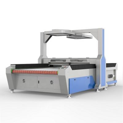 Cina Fabric sofa laser cutter machine 1600*3000mm with 150W tube and auto feeding in vendita