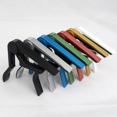 China cheap metal guitar capo price metal aluminum alloy capo metal guitar clip change folk musical instrument capo cheap guitar wholesal for sale