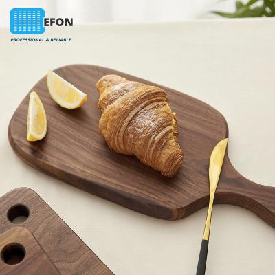 China Small Handle Solid Wood Tray Chopper Western Food Steak Beeswax Bread Panel Sustainable Whole Wood Special Shaped Board Pizza Dish for sale