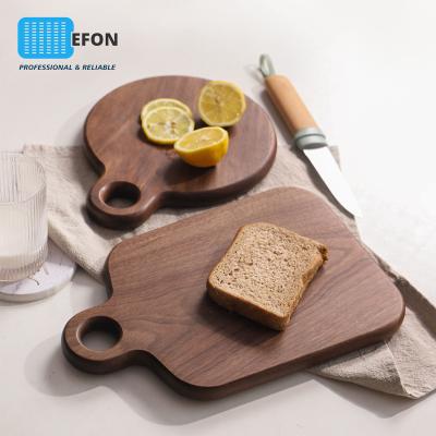 China Solid Wooden Cutting Board Small Tray Breadboard Wooden Unpainted Black Walnut Fruit Whole Wood Viable Cutting Board for sale