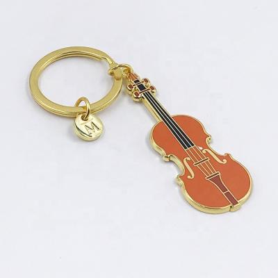 China Popular wholesale custom guitar key chain gold guitar shape key chain logo key chain for sale