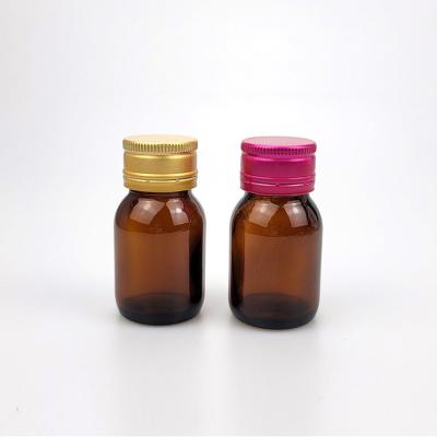 China 30ml Amber Oral Liquid Functional Drink Bottle Mini Beverage Bottle Medicinal Light Avoiding Syrup Glass Bottle for sale