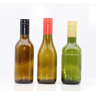 China 187ml mini beverage wine bottle fruit wine bottle fancy red wine dark green bottle with aluminum screw cap for sale