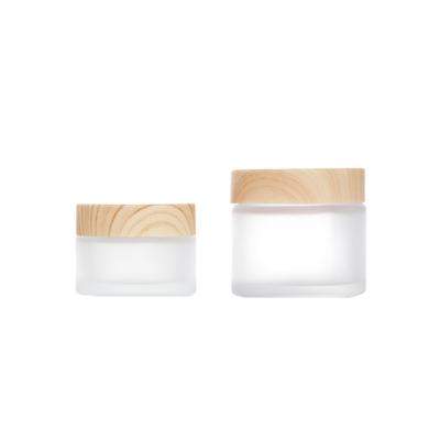 China Cosmetic In Stock Frosted Cream Jars Face Cream Container 5g 10g 15g 20g 30g 50g 60g Cosmetic Packaging Jars With Wood Grain Cover for sale