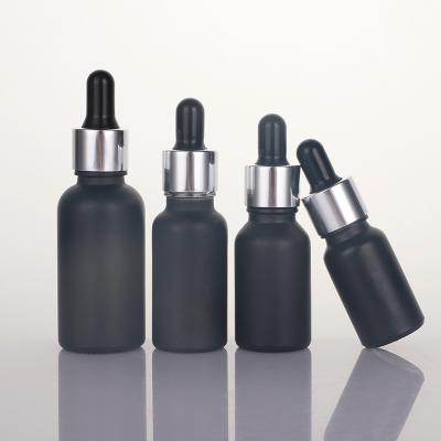 China Cosmetic Frosted Essential Oil Bottle Black Sub bottling Portable Dropper Bottle Cosmetic Glass Bottle 5-100ml Full Specifications for sale