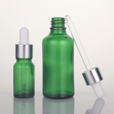 China Essential Oil Cosmetic Bottle 5ml 10ml 15ml 20ml 30ml 50ml 100ml Green Cosmetic Packing Green Glass Dropper Bottle for sale