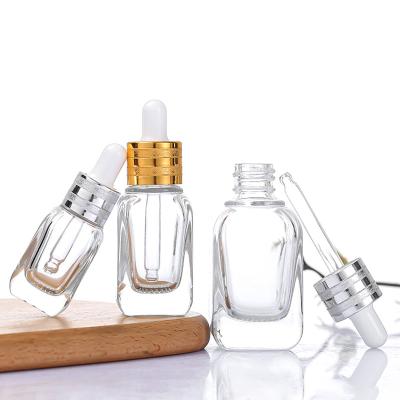 China Cosmetic Square Shape Essential Oil Bottles10ml 20ml 40ml Transparent Glass Dropper Bottle Cosmetic Packaging With Glass Tube for sale