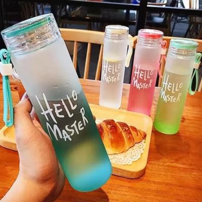 China Viable Hot Selling Colorful Frosted Portable Drinking Cheap Glass Water Bottle Wholesale Letter Bottle Gift With Lid for sale