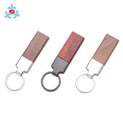 China Luxury Luxury Wooden Key Chain Custom Design Logo Blank Wooden Keychain for sale