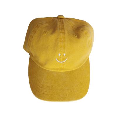 China 2020 new style hats COMMON yellow embroidery smiling face baseball hat washed style embroidery hat for sale