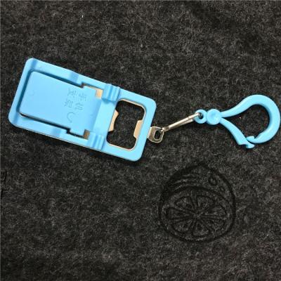 China Universal Key Ring Phone Holder Water Bottle Opener Mobile Phone Holder for sale