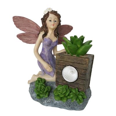 China Worldwide Solar Garden Lights Outdoor Resin Fairy Statue Lights Solar Outdoor for sale