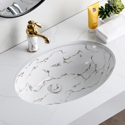 China EUROPEAN Undermount Design Oval White Marble Stone Drop In Ceramic Sink Bowl Bathroom Face Hand Wash Under Counter Mount Sink Basin for sale