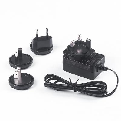 China Universal Detachable Wide Plug Power Adapter 12W 5V 9V 12V 24V Voltage Converter For Universal for sale