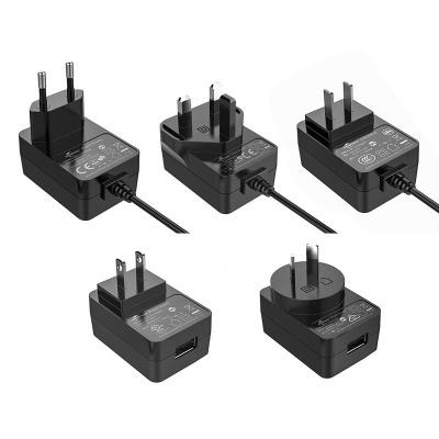 China Universal Multiple Socket Power Transformer 12W 5V 9V 12V 15V 19V 24V Universal Power Adapter for sale