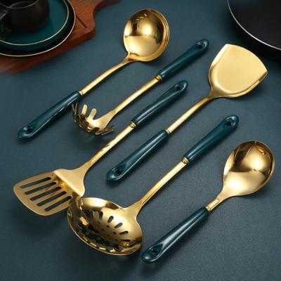 China Sustainable INS Style Gold Stainless Steel Cookware Cookware Set With Rack 7 Pcs Set Cooking Cooking Utensil Set With Green Handle for sale