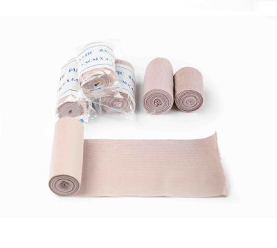 China Skin Color 100% Cotton Top Gauze Medical Crepe Bandage Roll Tubular Elastic Free Sample for sale