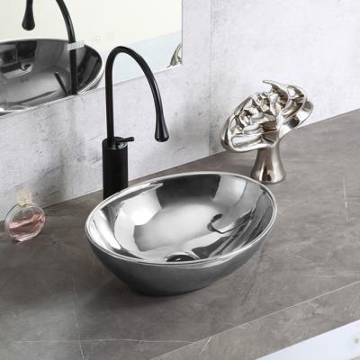 China Art Basin Ceramic Sink Made In China Silver Popular Countertop Bathroom Bathroom Sink for sale